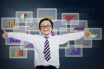 Pleased little businessman giving thumbs up