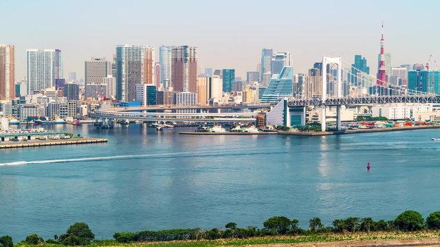 Time-lapse of Tokyo Bay with a view of the Rainbow Bridge, Tokyo Tower and the Tokyo skyline.