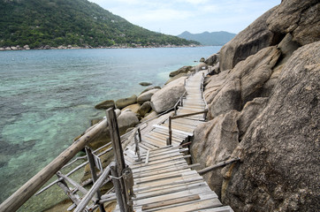 Fototapeta na wymiar Nang Yuan Island with blue sea and Wooden Footbridge to view point at the Gulf of Thailand