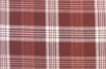 Brown and white tablecloth as background