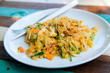 Seafood Noodles pad Thai on white disk