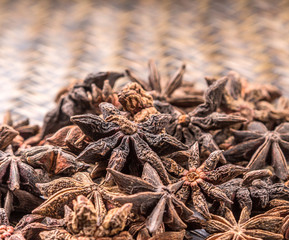 Star anise spice over wicker background