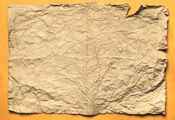 Rumpled sheet of paper.