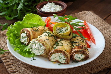Zucchini rolls with cheese and dill
