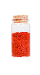 Powdered pimienta roja red pepper in a glass bottle with cork st