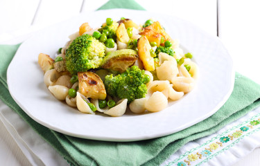 Fototapeta na wymiar Broccoli, zucchini and pea pasta