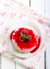 Raspberry cheesecake with sauce