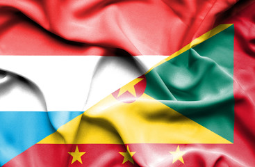 Waving flag of Guernsey and Luxembourg