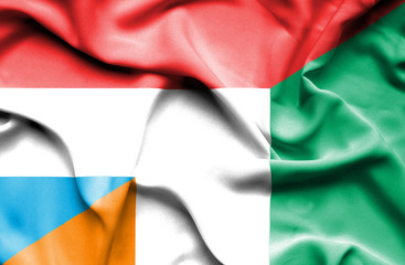 Waving flag of Ivory Coast and Luxembourg