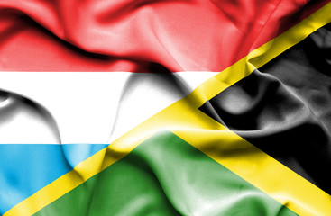 Waving flag of Jamaica and Luxembourg