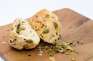  multigrain bread on wood chopping board