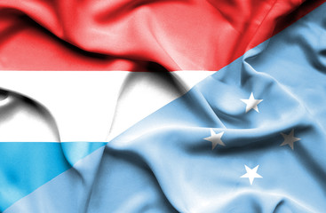 Waving flag of Micronesia and Luxembourg