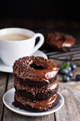 Chocolate donuts with coffee and blueberries