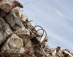 Rubble and twisted metal skyline on a demolition site