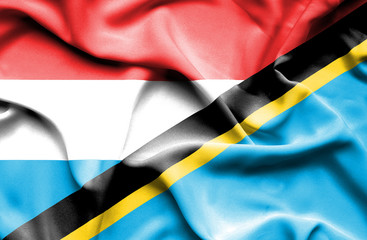 Waving flag of Tanzania and Luxembourg