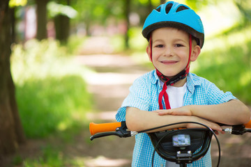 Cute little boy on bike