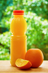 Orange and juice on the table