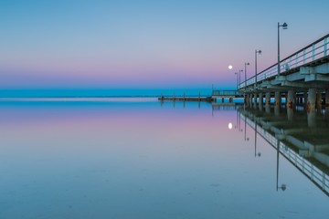 Landscape of pier in Jastarnia photographed before sunrise