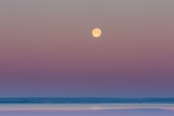 Moon setting over Gdanska Bay in Poland