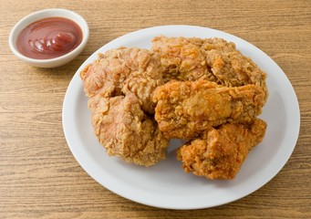 Fried Chicken with Sauce on A White Dish
