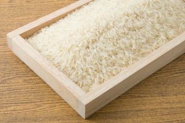 Thai Jasmine Rice in Brown Wooden Tray