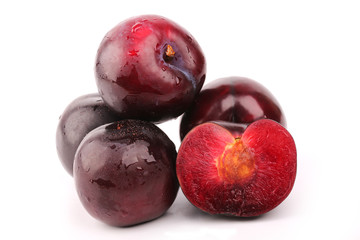 plum isolated on a white background juicy ripe red