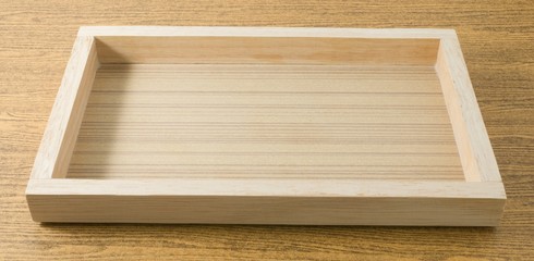 Empty Wooden Serving Tray on A Table