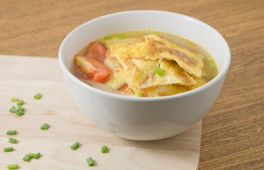 Delicious Thai Omelet Soup with Tomatoes, Onion and Scallion