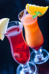 Two colorful cocktails