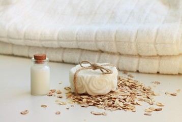 Fototapeta na wymiar homemade bar of milk oatmeal soap nourishing scrub skincare natural cosmetic products bathroom accessories spa