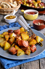 Potatoes with sausages