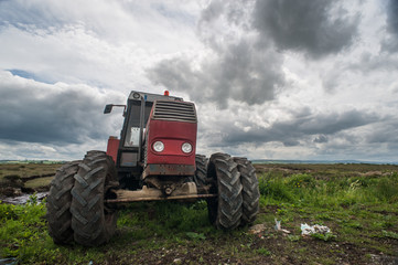 Fototapeta premium old Tractor rural Ireland Landscape