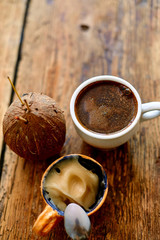 Cup of coffee on a wooden background