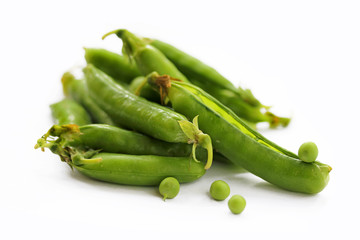 Green peas on a white background