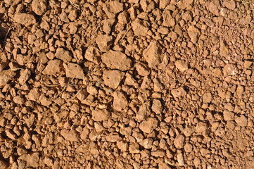 The stony ground.Brown background