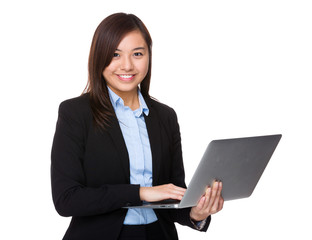 Businesswoman use of the laptop computer