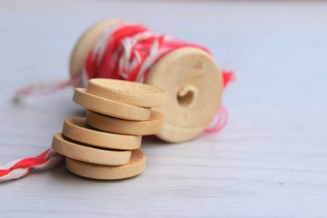Vintage wooden bobbin thread and buttons.