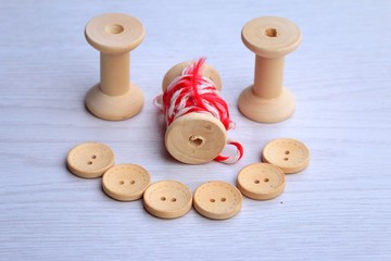 Vintage wooden bobbin thread and buttons.