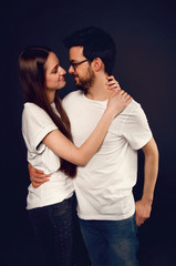 Young couple embracing and looking at each other