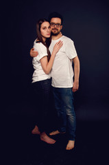 Young couple embracing and looking at each other