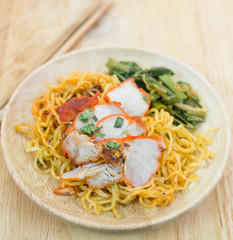 Chinese egg noodles with red pork and vegetables