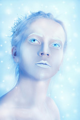 White woman with transparent eyes and white makeup