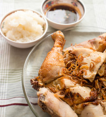 Roast chicken thai style with sticky rice and spicy sauce