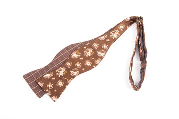 Flower colored bow tie isolated on white background