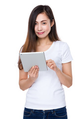 Asian Woman use of the tablet pc
