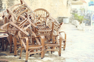 Fototapeta na wymiar wooden chairs in the cafe europa