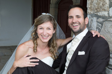 Groom and bride outside happy and in love
