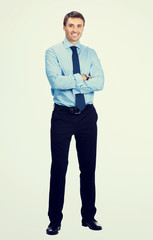 ful body of happy businessman in blue confident business wear