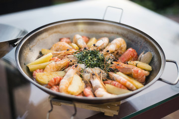mixed seafood stew in portuguese cataplana dish