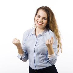 Portrait of a beautiful smiling young woman dressed in a blue sh